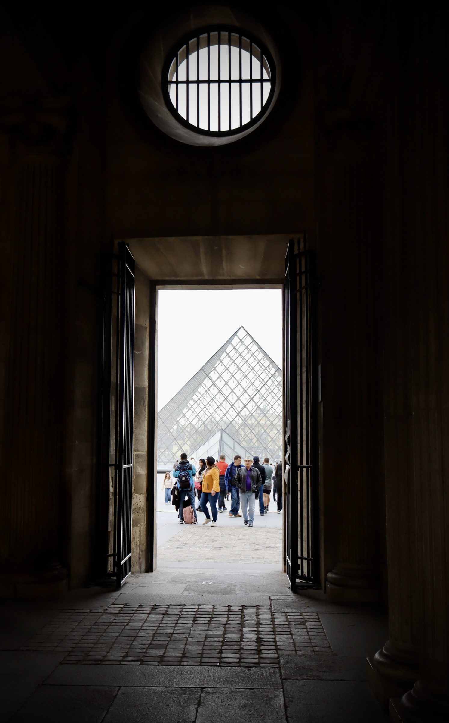 The Louvre, pyramid through the gate.