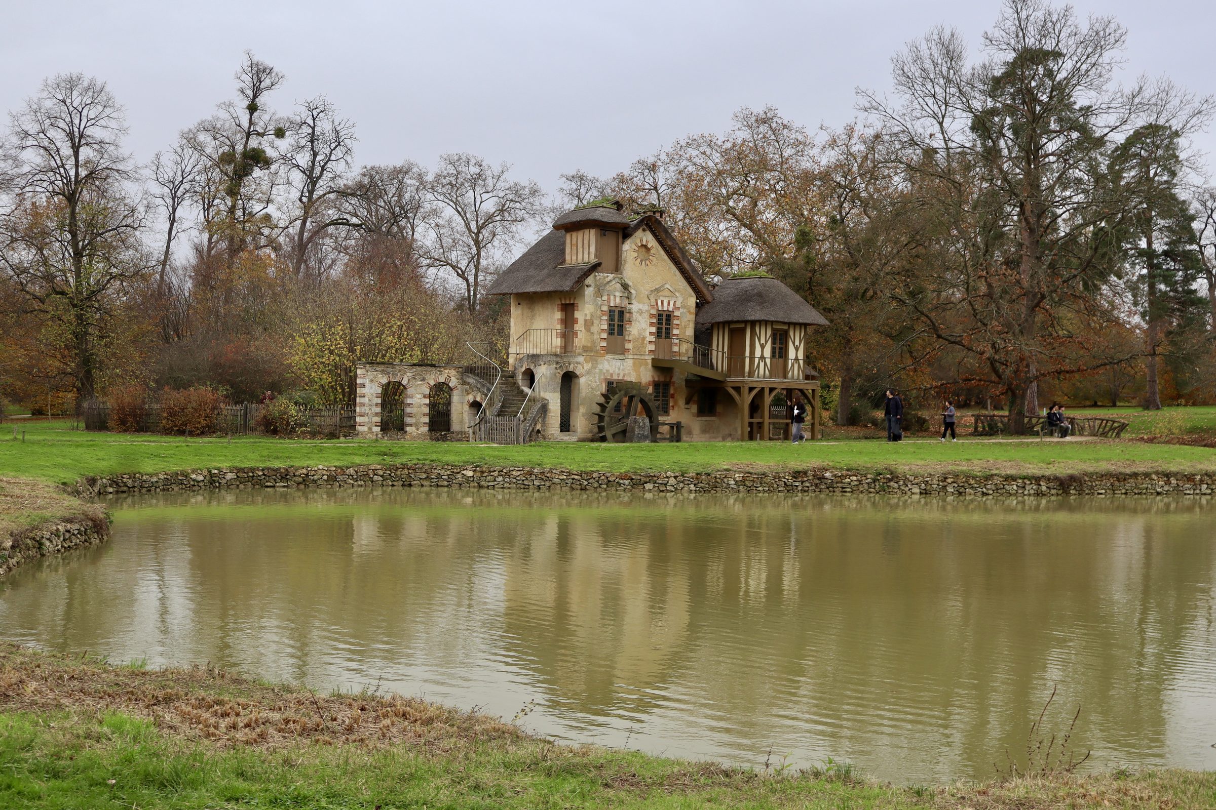Marie Antoinette's hameau reflected in the pond at Versailles.